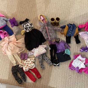 10 doll outfits plus shoes and accessories